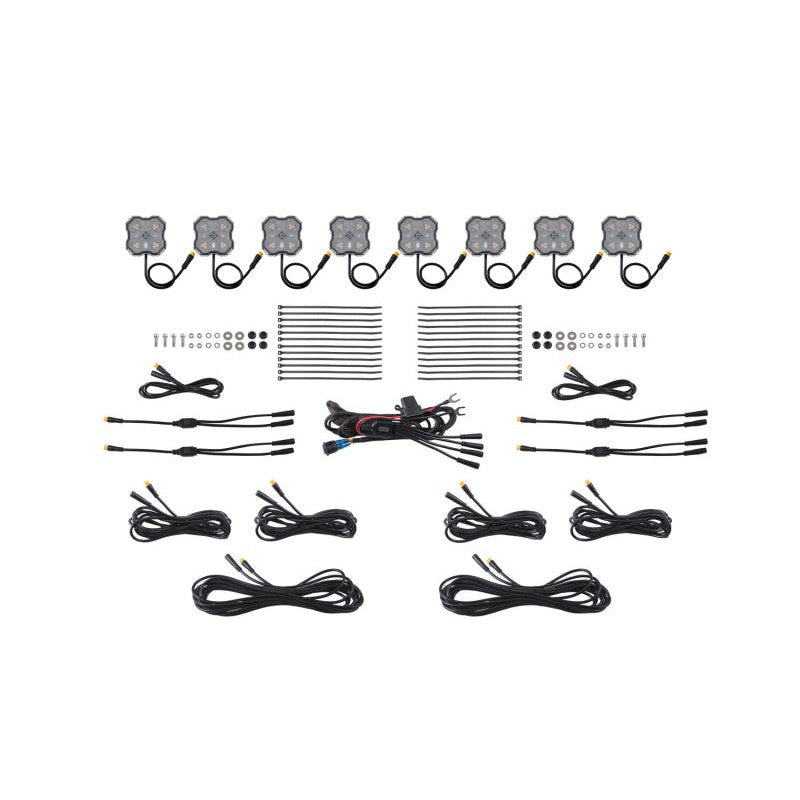 Eight Diode Dynamics Stage Series dual-color amber and white LED rock lights with integrated optics and aluminum housings.