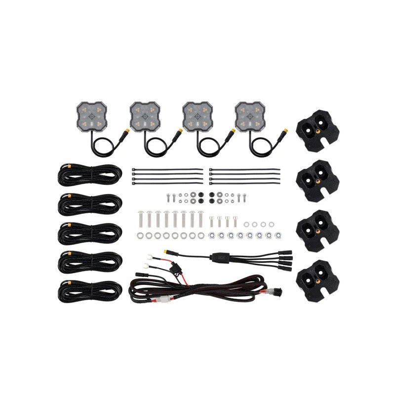 Diode Dynamics Stage Series dual color white and amber LED rock lights with angled bed rack mounting brackets.
