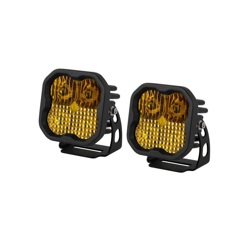 Pair of Diode Dynamics SS3 Sport 3-inch LED pod lights featuring yellow lenses and amber backlighting.