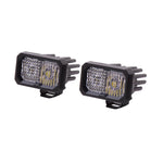 Pair of Diode Dynamics Stage Series 2 inch Sport LED Pods with White Combo TIR optics and integrated heatsinks.