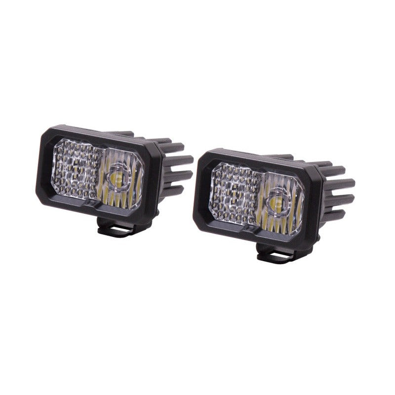 Pair of Diode Dynamics Stage Series 2 inch Sport LED Pods with White Combo TIR optics and integrated heatsinks.