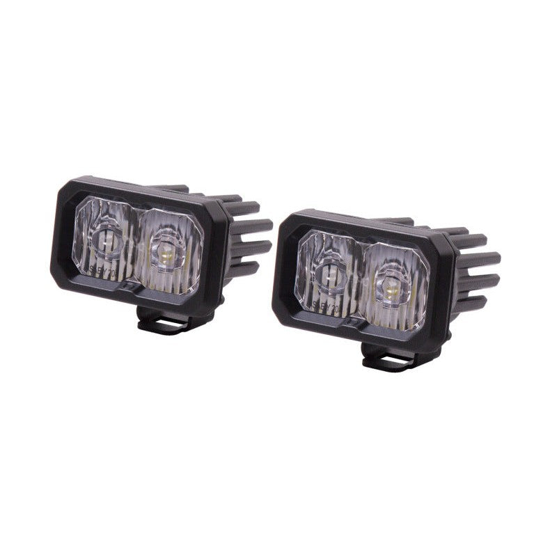 Pair of Diode Dynamics Stage Series 2 inch white driving LED pods with black powdercoated aluminum housing.