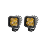Diode Dynamics SSC1 Yellow Flood LED Pod Pro pair featuring TIR optics and amber backlighting.