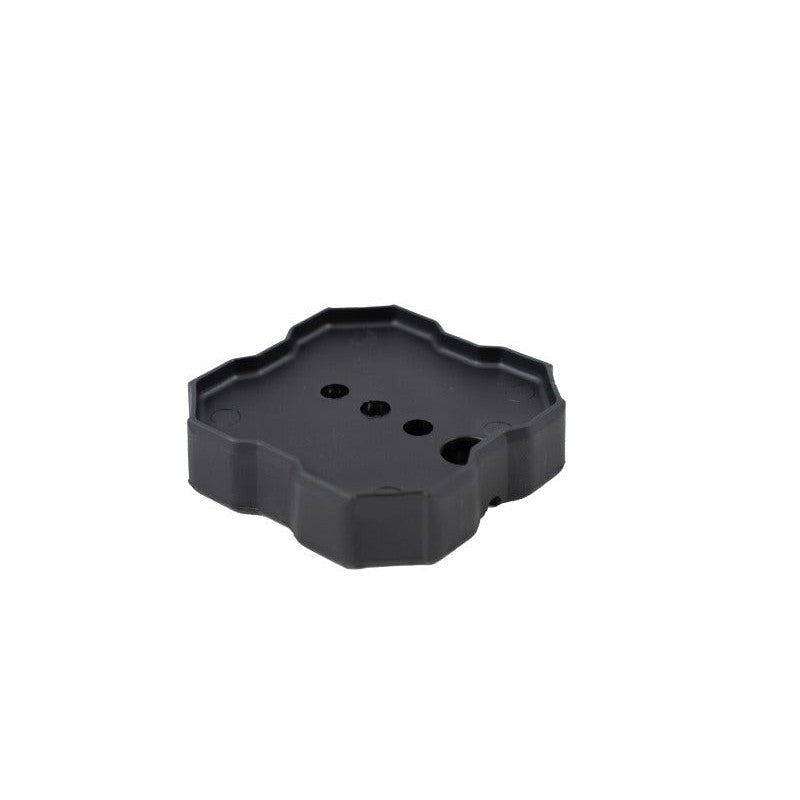 Black polyurethane overmolded magnetic mount adapter for Diode Dynamics Stage Series Rock Lights.