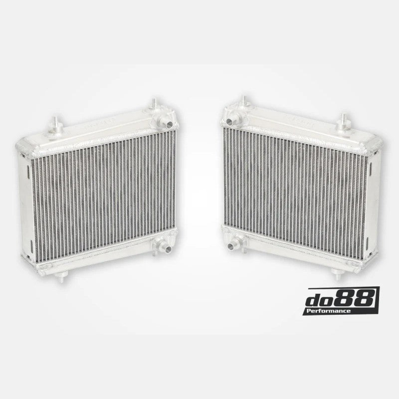 Pair of do88 aluminum auxiliary radiators for BMW S58 engines in G80 M3, G82 M4, and G87 M2 models.