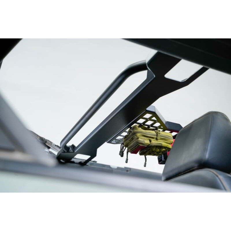 Micro-texture black powder coated overhead Molle storage panels installed in a Ford Bronco 4-Door interior.