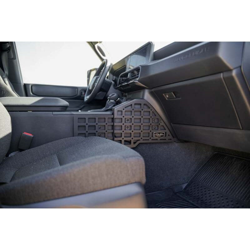 Black micro-texture powder coated steel molle panels installed on a 2024 Toyota Land Cruiser center console.