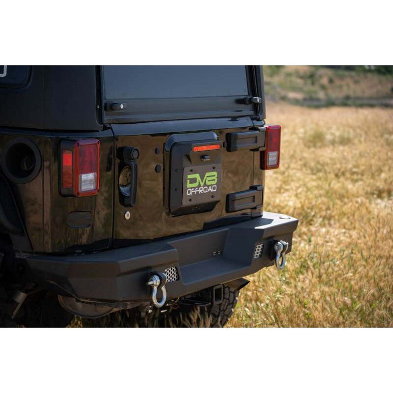 DV8 Offroad micro-texture black steel spare tire delete plate with LED license plate light for Jeep Wrangler JK.