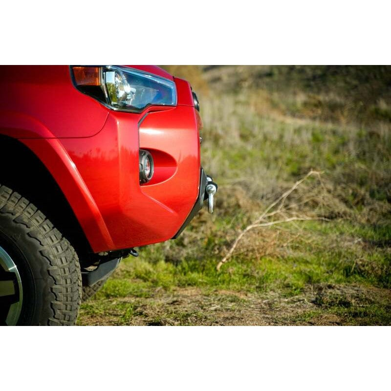 DV8 Offroad Centric Series winch front bumper in micro-texture black on a 2014-2024 Toyota 4Runner.