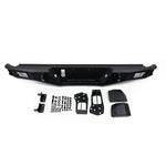 DV8 Offroad MTO Series micro-texture black rear bumper with side steps and mesh inserts for 2016-2023 Toyota Tacoma.
