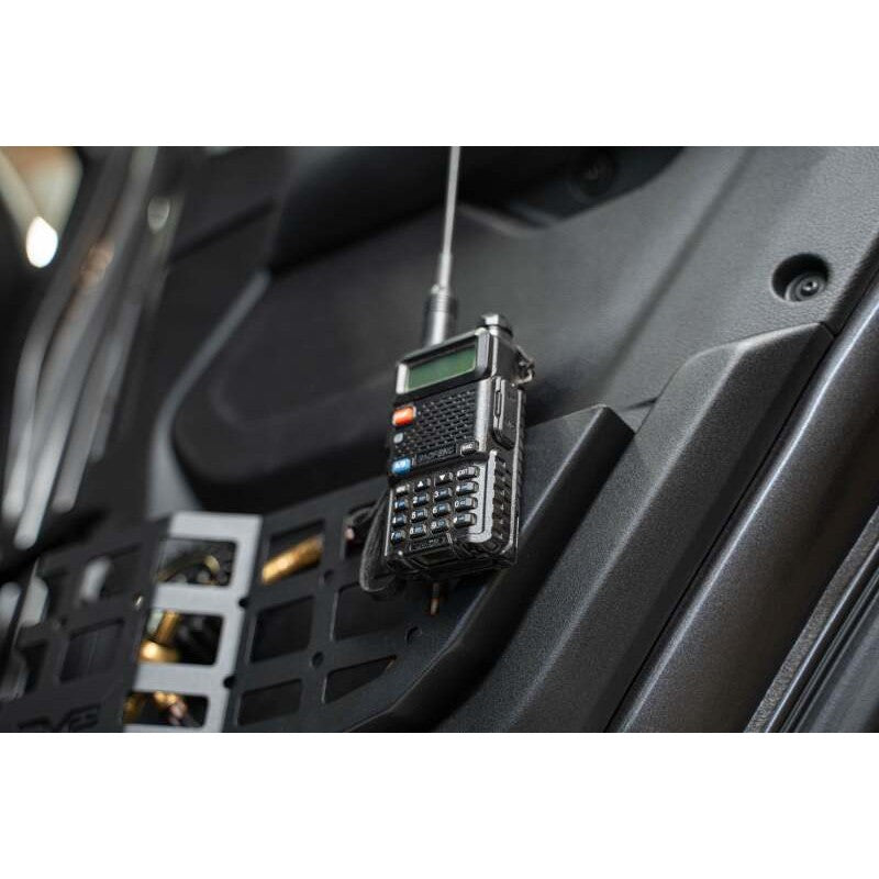 DV8 Offroad micro-texture black steel rear door pocket Molle panels installed on a Jeep door panel.