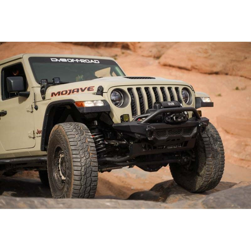 DV8 Offroad Spec Series high-clearance front winch bumper with bull bar for 2018-2025 Jeep Wrangler and Gladiator.