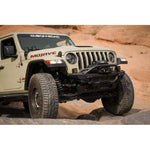 DV8 Offroad Spec Series high-clearance front winch bumper with bull bar for 2018-2025 Jeep Wrangler and Gladiator.