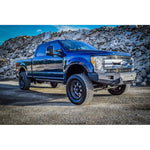 DV8 Offroad FBFF2-03 modular winch front bumper in sand texture black with LED light cutouts and mesh inserts