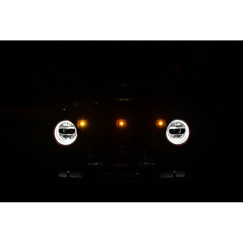 Three amber LED grille marker lights with black mounting bracket for 2018-2025 Jeep Wrangler and Gladiator