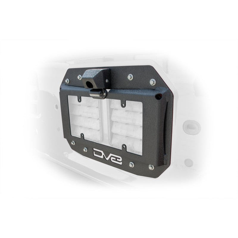 DV8 Offroad TSJL-02 spare tire delete plate with backup camera housing and license plate mount on a Jeep tailgate