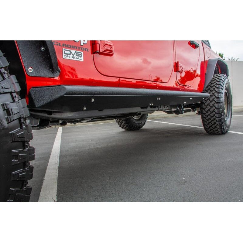 Black steel DV8 Offroad SRGL-02 side step sliders with raised traction panels for 2020-2025 Jeep Gladiator.