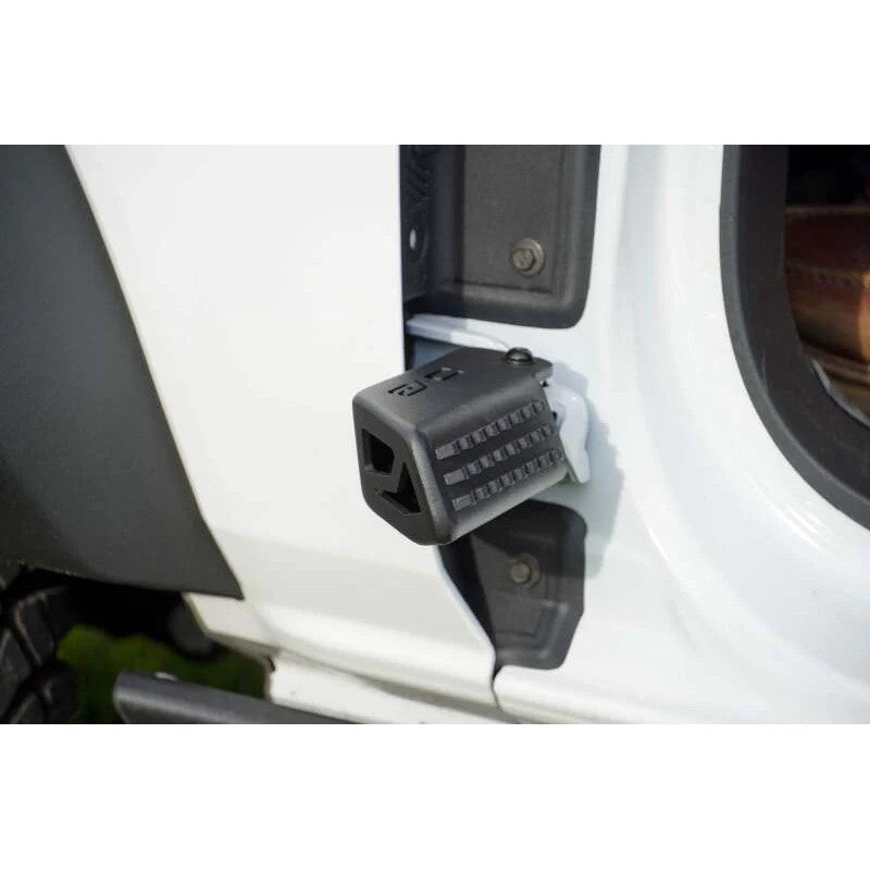 DV8 Offroad black micro-texture powder coated foot pegs installed on a Ford Bronco door hinge.