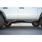 DV8 Offroad black micro-texture powder coated steel trailing arm skid plates for 2021-2026 Ford Bronco.