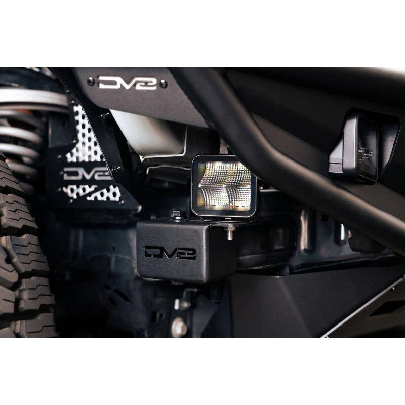 DV8 Offroad black micro-texture powder coated steel crash bar caps with accessory mounting tabs for 2021-2026 Ford Bronco.