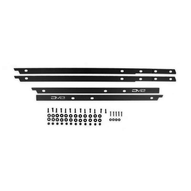 Black powder coated steel DV8 Offroad pinch weld covers installed on a 2021-2025 Ford Bronco
