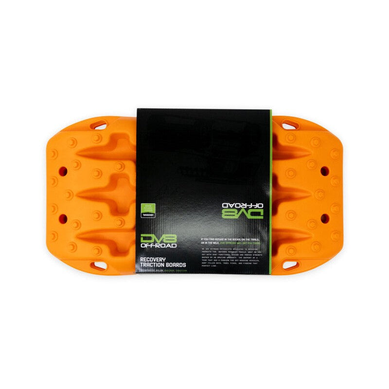 A pair of stackable orange DV8 Offroad Xtract Mini traction boards featuring molded handles and mounting holes.