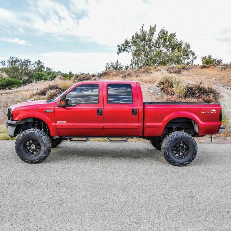 Westin Outlaw Drop Nerf Step Bars; 1.5in Tube; Textured Black - Fits 1999-2016 Ford F-250/F-350 Super Duty Crew Cab