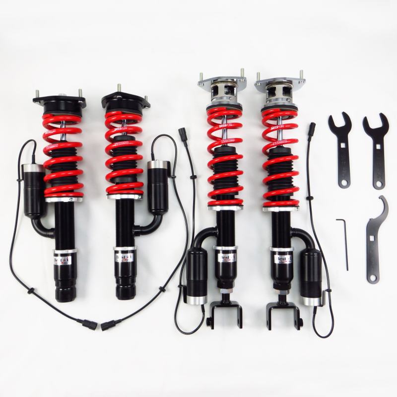 RS-R Best-i Active coilover suspension kit for Infiniti Q50 Red Sport AWD showing electronic damping actuators.