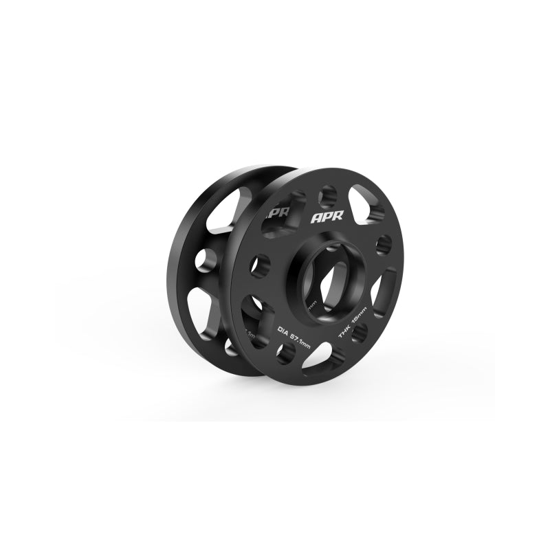 Set of two black anodized APR 15mm wheel spacers with a 5x112 bolt pattern and hub-centric rings