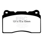 EBC Brakes Ultimax2 front brake pad set featuring shims, slots, and chamfered edges for noise reduction.