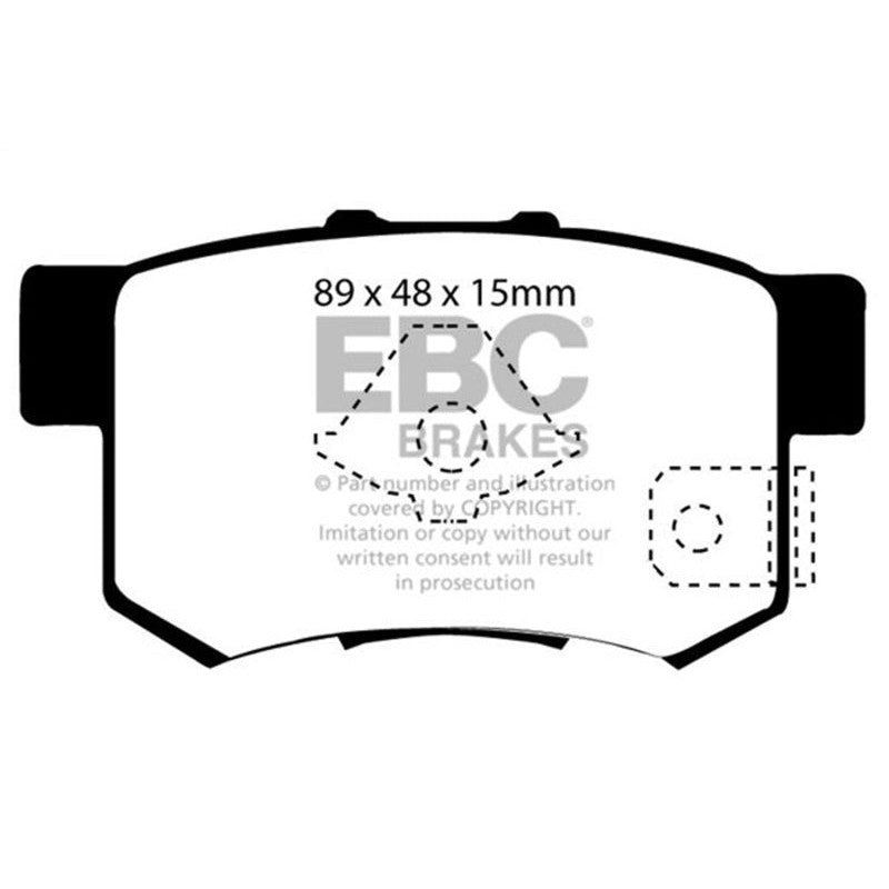 EBC Brakes Ultimax2 UD1086 rear brake pads featuring a shimmed, slotted, and chamfered design for quiet operation.