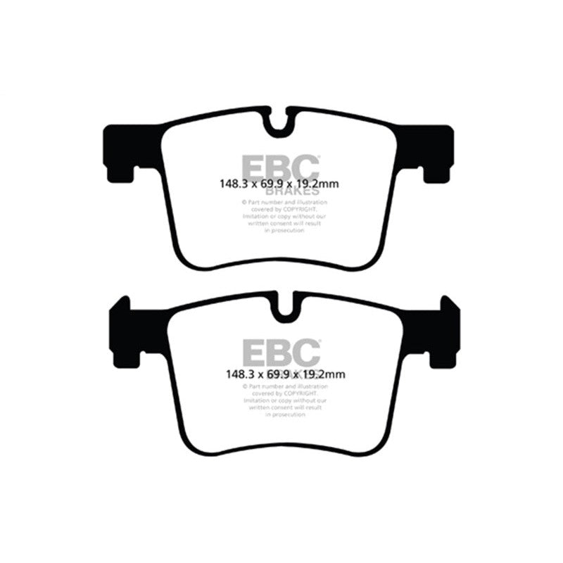 EBC Brakes Ultimax2 UD1561 front brake pads featuring noise-reducing shims, center slots, and chamfered edges.