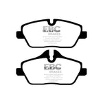 EBC Redstuff high-performance ceramic front brake pad set featuring red friction material and Brake-In coating.