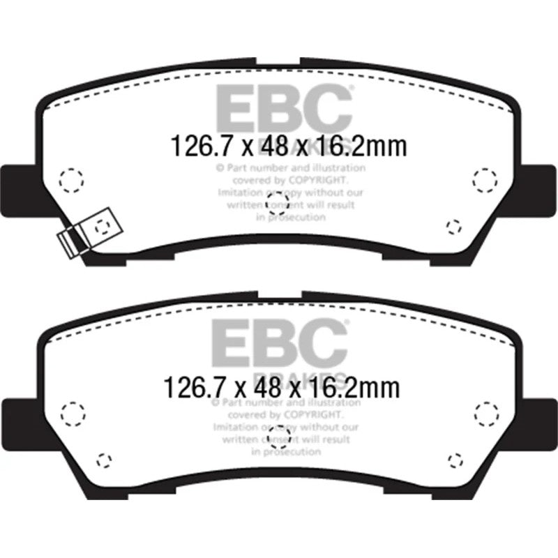 A set of EBC Yellowstuff high-performance rear brake pads for S550 Ford Mustang.