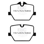 EBC Racing RP-X track-spec rear brake pads with stainless steel backing plates and Nucap NRS retention hooks.
