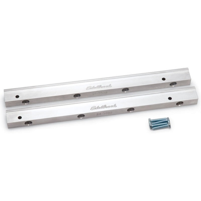 Clear anodized aluminum Edelbrock 3639 fuel rails with mounting stands and hardware for Ford 4.6L engines.