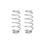 Pair of silver Eibach heavy-duty rear coil springs and air bag delete conversion kit components.