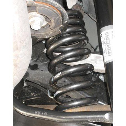 Four gray Eibach Pro-Kit lowering springs for Chrysler 300 suspension