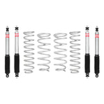 Eibach Pro-Truck Lift Stage 1 system including silver lift springs and nitrogen-charged shocks for Toyota Land Cruiser.