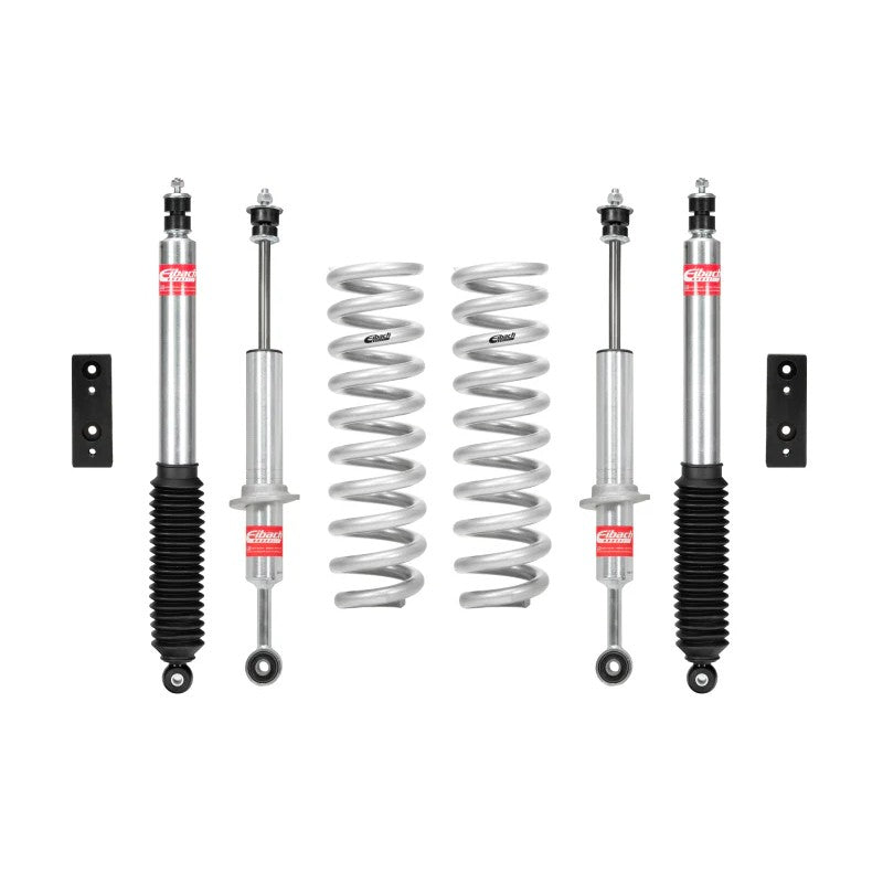 Eibach PRO-TRUCK-LIFT Stage 1 suspension system including silver coil springs and performance shocks for Toyota Tacoma.