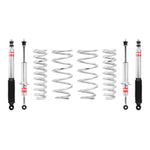 Eibach PRO-TRUCK-LIFT Stage 1 kit including four silver coil springs and four performance shocks for Toyota FJ Cruiser.