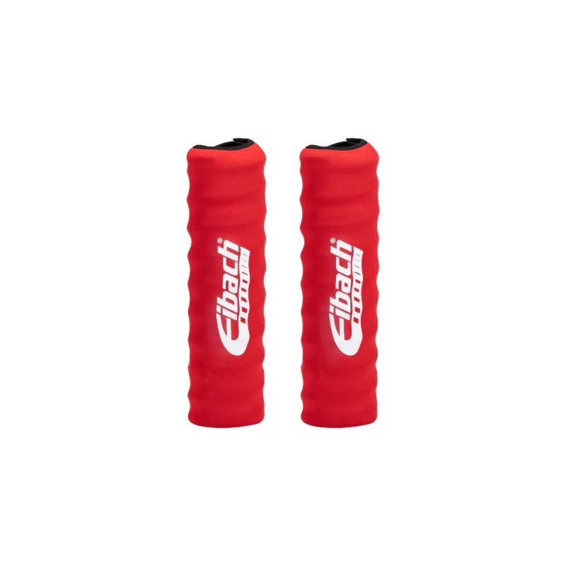 A pair of black Eibach protective spring bags with Velcro split openings for coilover suspension protection.