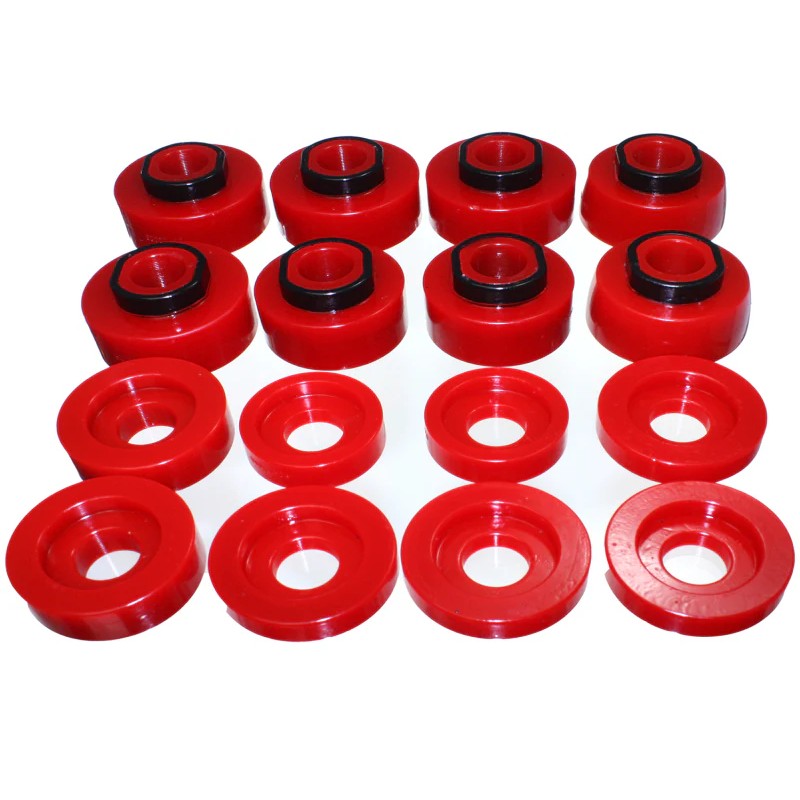 Energy Suspension 4.4124R Hyper-Flex red polyurethane body mount bushings with zinc-plated steel hardware.
