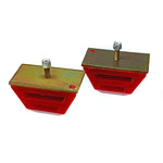 Pair of red Energy Suspension 2-1/2 inch heavy duty polyurethane bump stops with circular metal mounting plates.