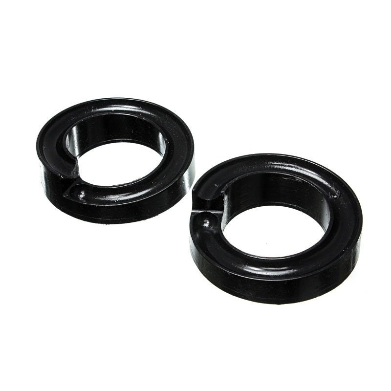 A pair of black Energy Suspension Hyper-Flex polyurethane front coil spring isolators for 2005-2007 Ford Super Duty trucks.