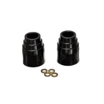 Pair of black 3-1/8 inch Energy Suspension Hyper-Flex polyurethane bump stops with integrated metal mounting plates.
