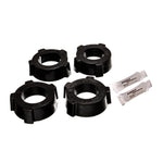Black polyurethane rear spring plate bushings for 1954-1968 Volkswagen Beetle swing axle suspension.