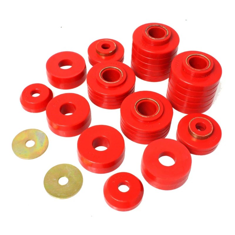 Red Energy Suspension Hyper-Flex polyurethane cab and body mount bushings with zinc-plated steel inserts.