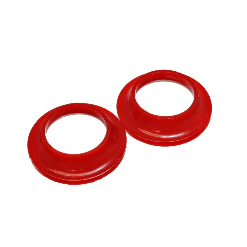 Two red Energy Suspension Hyper-Flex polyurethane rear upper coil spring isolators