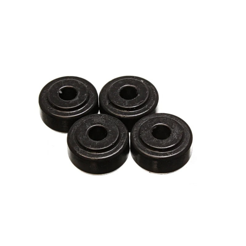 Set of four black Energy Suspension Hyper-Flex polyurethane shock tower grommets for bayonet-style shock absorbers.
